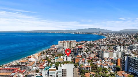 Property building, Day, Natural landscape, Bird's eye view, Beach, Mountain view, Sea view, Location