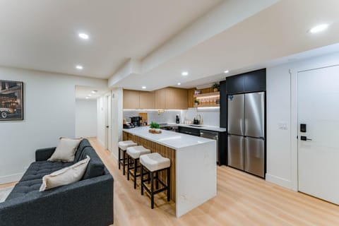 Kitchen or kitchenette, dishwasher, oven, stove
