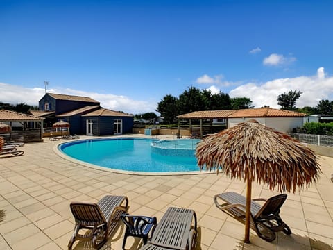 Property building, Living room, Swimming pool