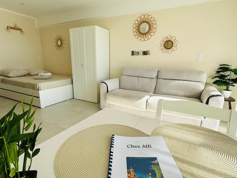 Bed, Seating area, wardrobe