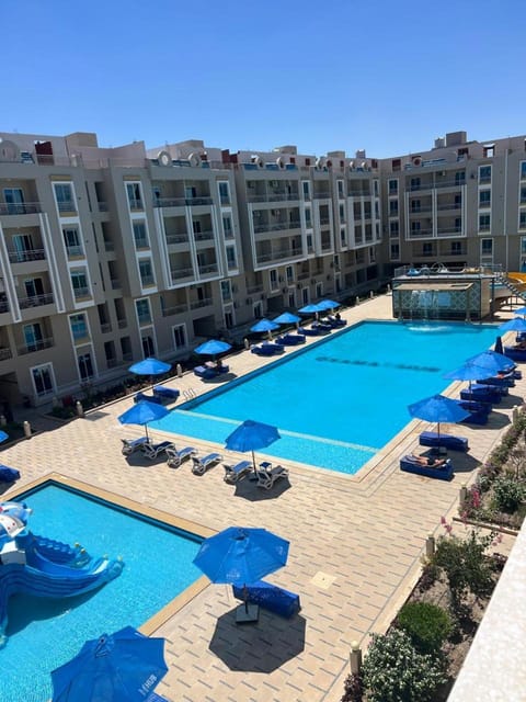Property building, Pool view, Swimming pool, sunbed