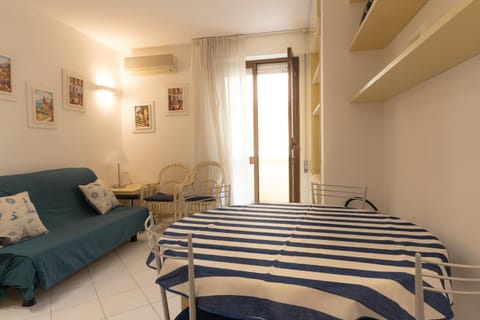 Bed, Living room, Dining area