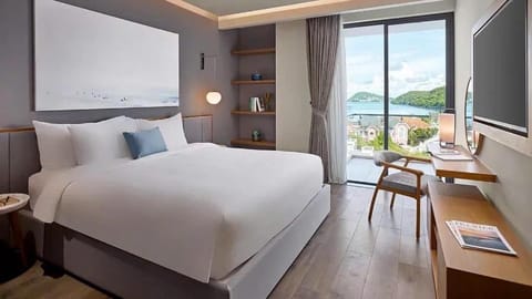 Bed, Seating area, Bedroom, Sea view