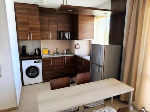 Dining area, stove, toaster, washing machine
