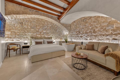 Bed, Living room, Seating area, Bedroom