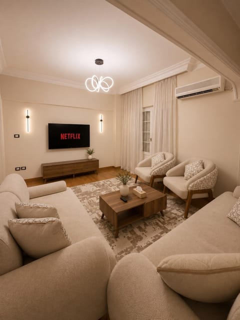 TV and multimedia, Living room, Seating area, Evening entertainment, air conditioner