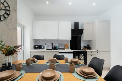 Dining area, microwave, oven, toaster, kitchen