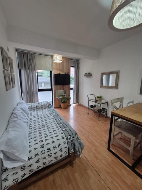 Bed, TV and multimedia, Living room, Seating area