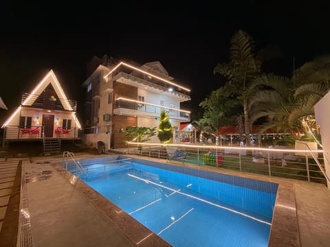 Property building, Night, Pool view, Swimming pool