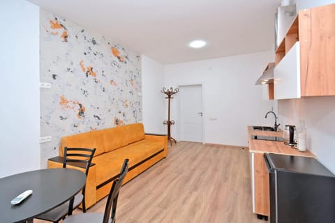 Living room, Lobby or reception, Seating area, Dining area, stove