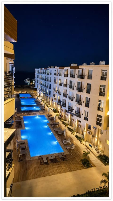 Property building, Night, View (from property/room), Balcony/Terrace, Swimming pool