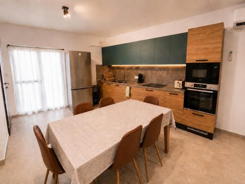 Dining area, dishwasher, oven, stove