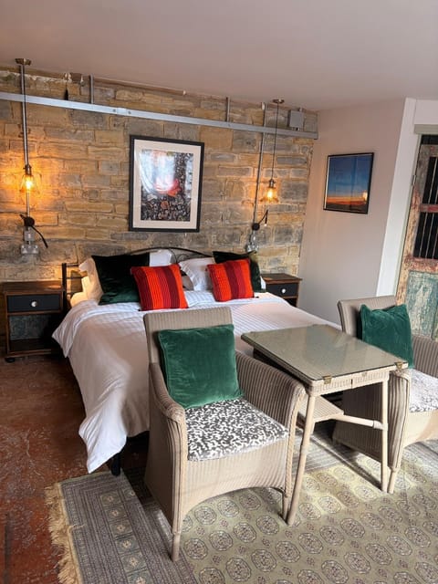 Bed, Seating area, Bedroom