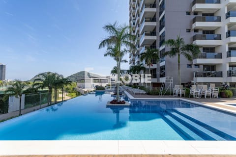Property building, Day, Pool view, Swimming pool, Swimming pool, sunbed