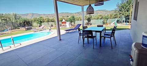 Patio, Day, Natural landscape, Dining area, Mountain view, Pool view, Swimming pool, sunbed