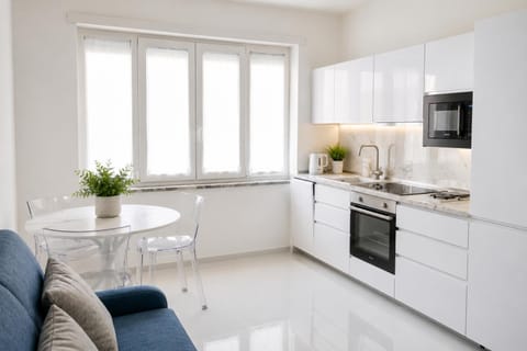 Kitchen or kitchenette, Living room, Seating area, Dining area, dishwasher, oven, stove, toaster
