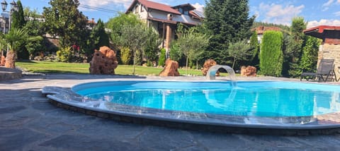 Property building, Day, Natural landscape, Garden, Garden view, Pool view, Swimming pool