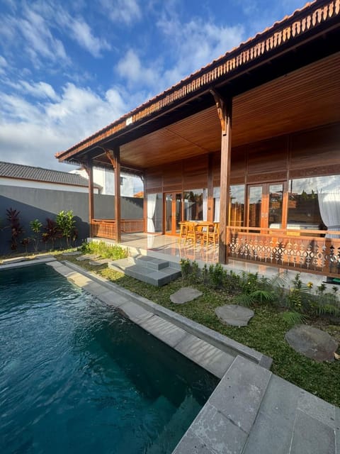 Property building, Patio, Day, Natural landscape, Garden, Garden view, Pool view, Swimming pool