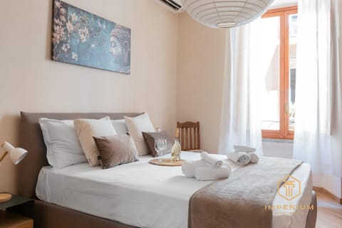 Bed, Photo of the whole room, Bedroom, towels, air conditioner