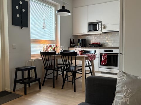 Kitchen or kitchenette, Seating area, Dining area, oven, stove, toaster
