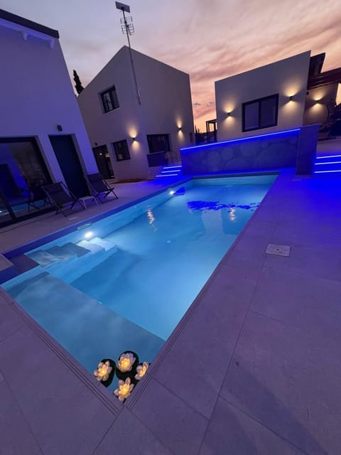Night, Pool view, Swimming pool, sunbed