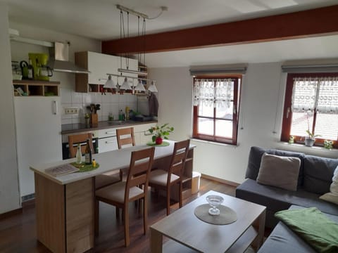 Kitchen or kitchenette, Living room, Seating area, Dining area