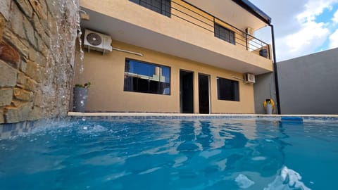 Property building, Day, Pool view, Swimming pool