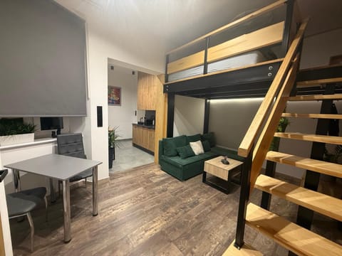 Kitchen or kitchenette, Living room, Seating area, Dining area
