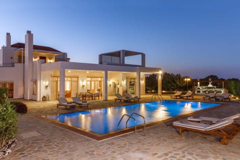 Property building, Patio, Night, Pool view, Swimming pool, sunbed