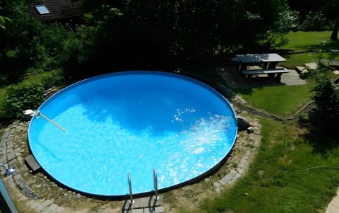 Property building, Living room, Swimming pool