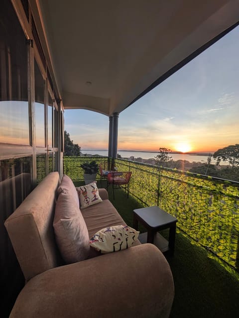 Natural landscape, View (from property/room), Balcony/Terrace, Seating area, Lake view, Sunset