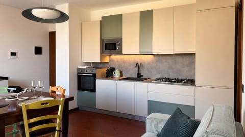 Kitchen or kitchenette, Living room, Dining area, dishwasher, minibar, oven, stove