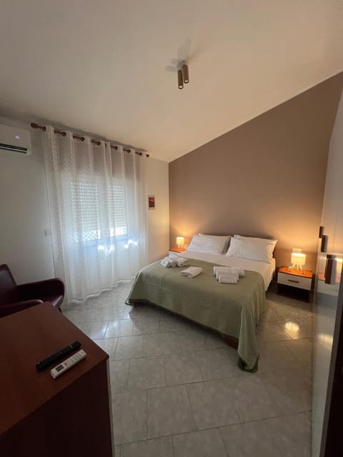 Bed, Photo of the whole room, Bedroom, towels, air conditioner