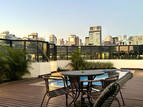 View (from property/room), Balcony/Terrace, City view, Swimming pool
