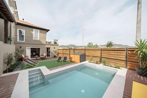 Property building, Living room, Swimming pool