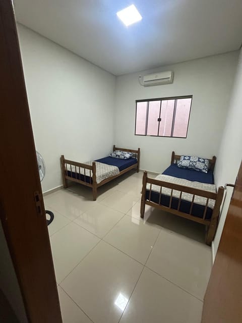 Bed, air conditioner