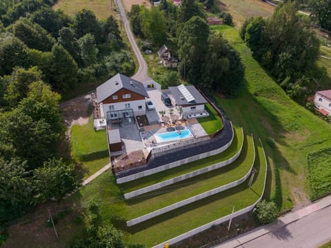 Property building, Natural landscape, Bird's eye view, Garden view, Swimming pool, sunbed
