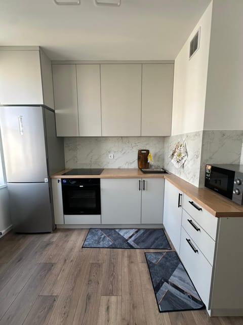 Kitchen or kitchenette, oven, stove