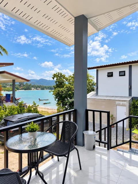 Property building, Patio, Day, Natural landscape, View (from property/room), Balcony/Terrace, Seating area, Dining area, Sea view