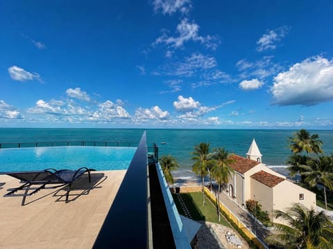 View (from property/room), Balcony/Terrace, Pool view, Sea view, Swimming pool, Swimming pool, sunbed