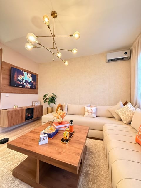 Living room, Seating area, fireplace, air conditioner