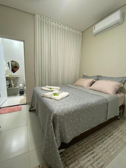 Bed, Photo of the whole room, Bedroom, towels, air conditioner