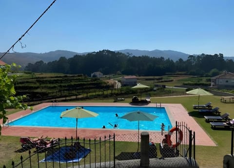 Property building, Living room, Swimming pool