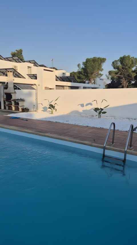 Property building, Living room, Swimming pool