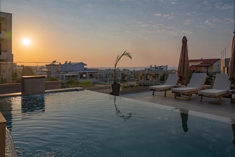 Patio, Day, Swimming pool, Sunset, sunbed