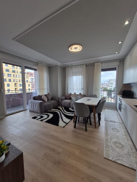 Kitchen or kitchenette, Living room, Seating area, Dining area