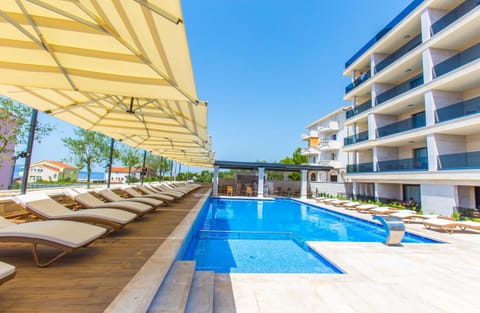 Patio, Day, Pool view, Swimming pool, sunbed