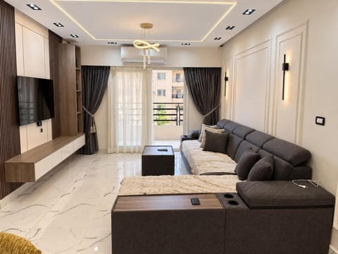 Communal lounge/ TV room, TV and multimedia, Seating area, air conditioner