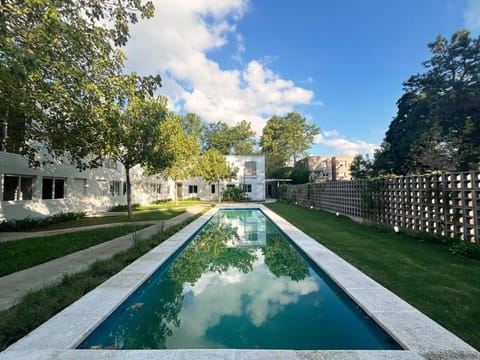 Property building, Spring, Day, Natural landscape, Garden, Garden view, Pool view, Swimming pool