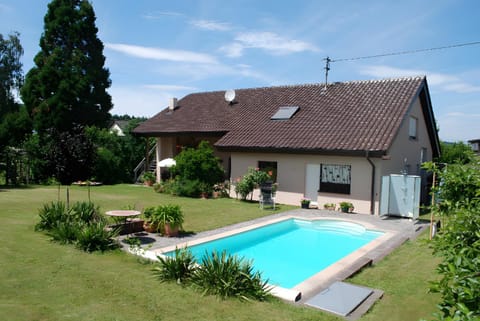 Property building, Living room, Swimming pool